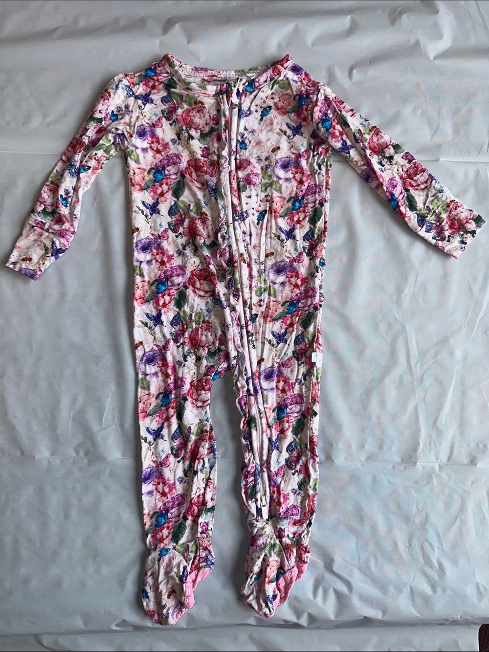 Posh Peanut Pink, Purple and Green Floral Footed One-Piece
